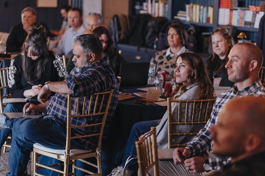 Mastermind Attendees Listening to session