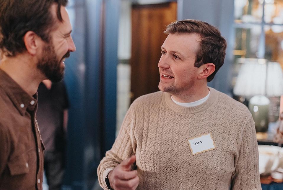 Wes Gay chatting with a mastermind attendee